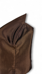 Close-up of metallic textured fabric in brown corset top