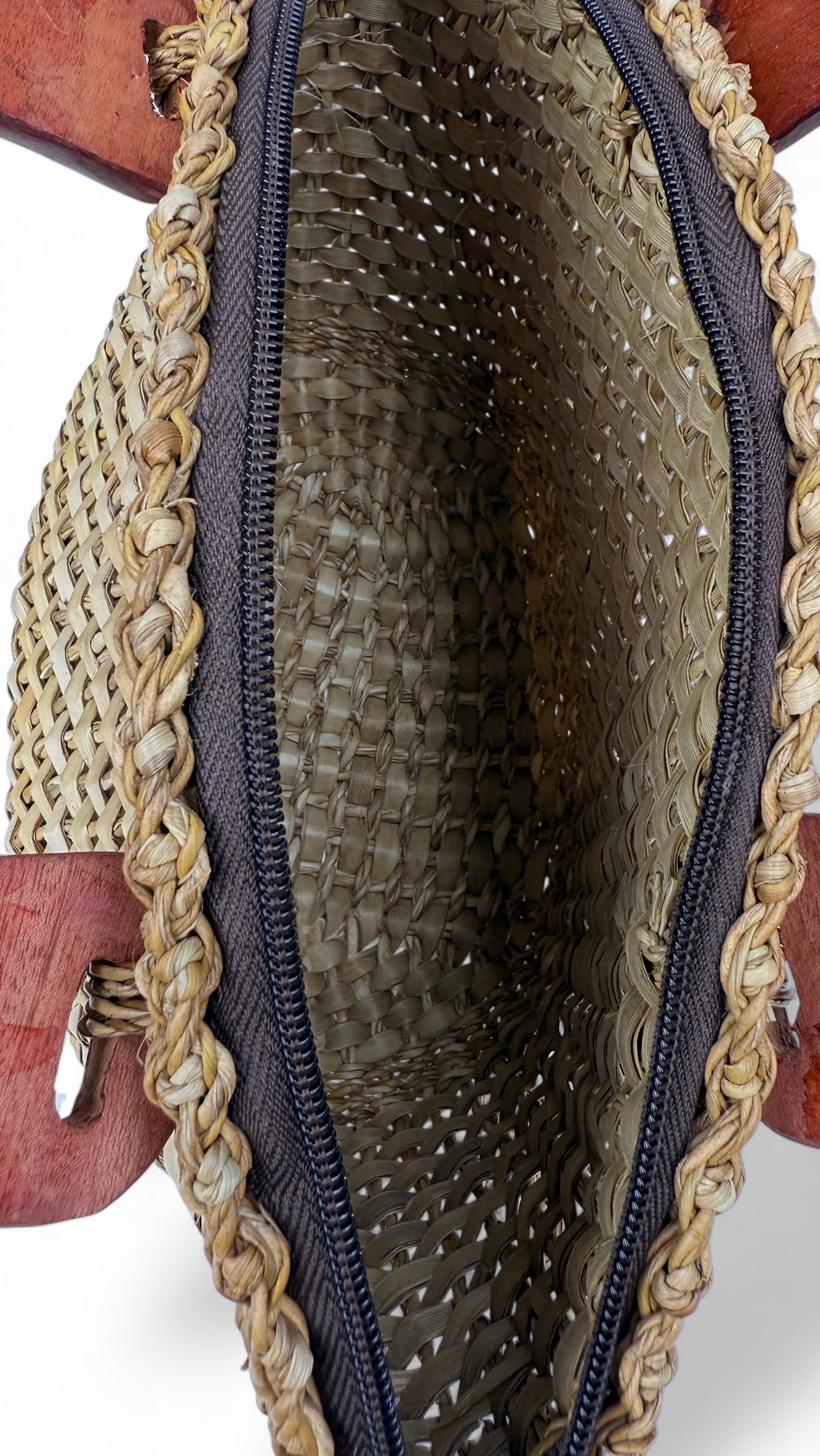 Structured woven tote with polished wooden handles and zip closure