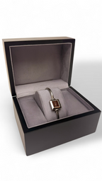 Jewelry box with a bracelet Gucci watch inside on a white background